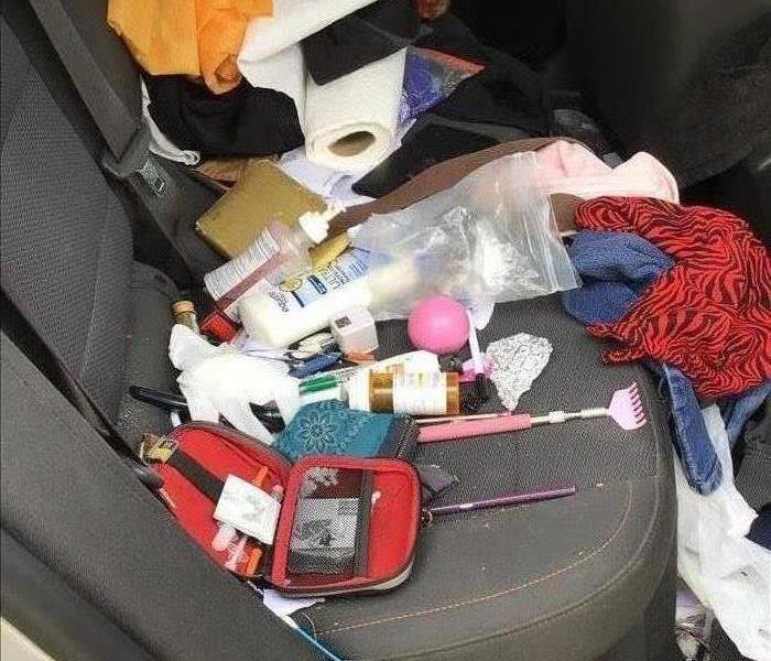 Backseat of a car covered in bio hazard things. 