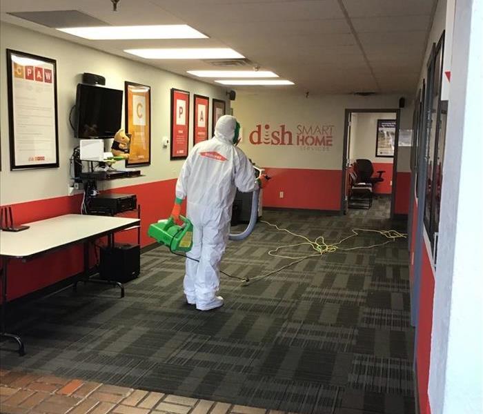 Technician making sure to disinfect the open areas 